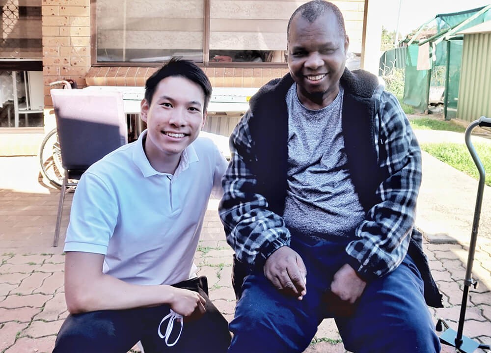 Support worker and NDIS participant together